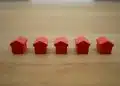 red blocks on brown wooden table