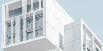 white modern cement building under blue sky