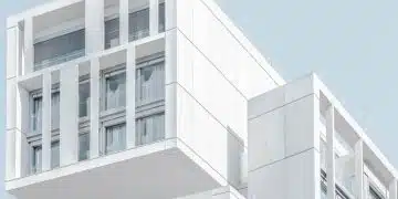 white modern cement building under blue sky